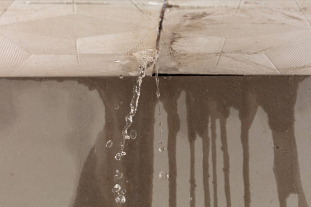 Professional Flood Damage Cleanup technician working in Picayune, MS